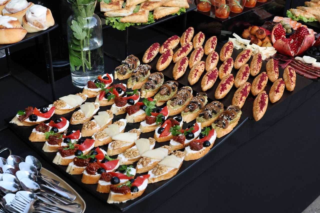 A vibrant assortment of finger foods on a table, perfect for catering and event dining.